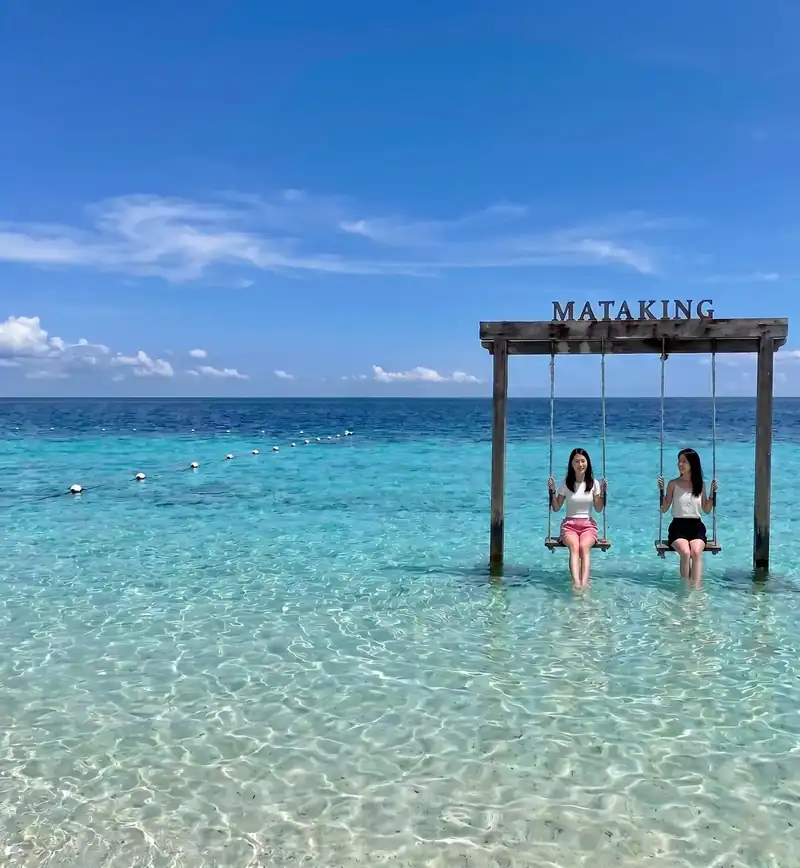 Exploring the sandbars of Mataking Island with Nusakuya Resort in the Semporna Islands area.
